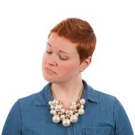 red hair woman looking down