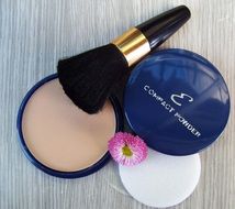 compact Powder and brush, Makeup still life
