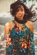 brunette in a flowery dress