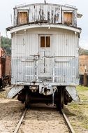 wooden train carriage on rails