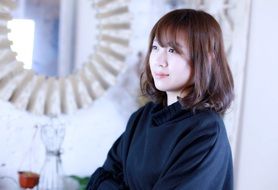 Asian girl in a photo studio