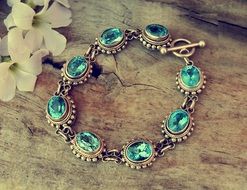 vintage bracelet with green gemstones