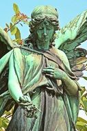 old angel statue in a cemetery