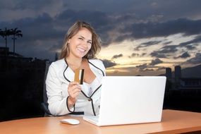 business woman at the table with laptop