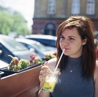 young girl with a refreshing drink