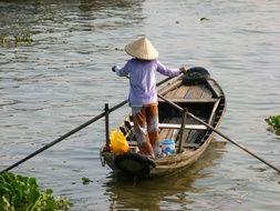 woman on a boat in asia