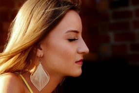 blonde profile with beautiful earrings