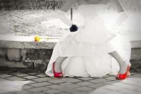 bride in red wedding shoes