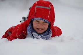 boy having fun with snow