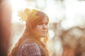 autumn portrait of a young woman
