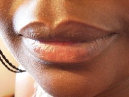 African Womanâs Lips close up