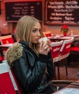 girl drinking coffee at the table