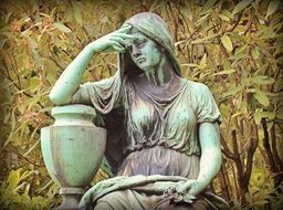 stone sculpture of a woman