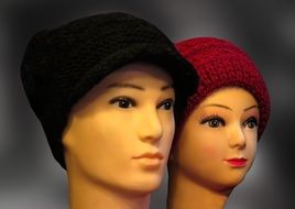 male and female head mannequinss in hats