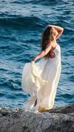 posing woman in romantic white dress