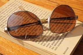 sunglasses on the book