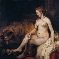 naked woman sitting on the armchair