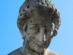 face of a stone female statue