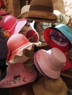 sun hats on a store counter