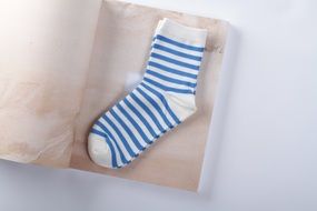 White and blue socks with the stripes