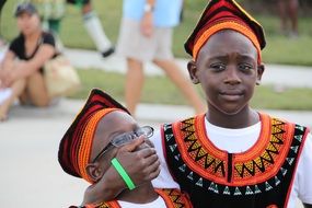 traditional dressed African woman with child boy