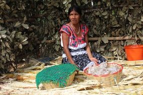 mexican woman behind craft