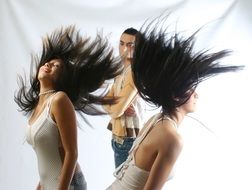 girls shake their hair