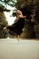 girl dancing in the black dress