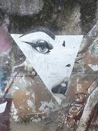 Graffiti wall with the image of the woman's face