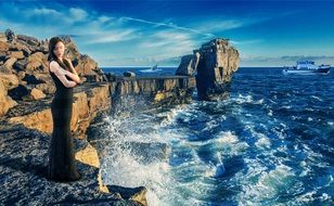 girl model on a picturesque rocky coast