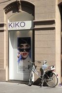 showcase a photo of a model wearing glasses and a bike