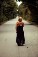 girl standing on the road
