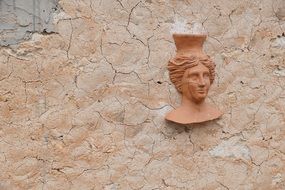 ceramic sculpture on the wall in Spain