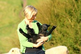 blonde with black puppies