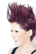 portrait of a woman with red stylish haircut