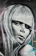 picture of a woman on a wall in larnaca