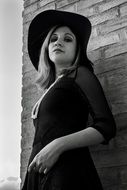 black and white portrait of a girl in a black dress