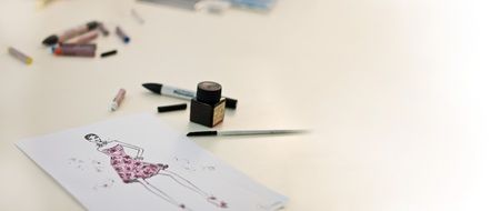 girl in stylish dress, Drawing on table