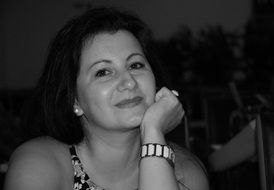black and white portrait of an adult woman with a smile