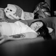 woman sleeping on the sofa in black and white background