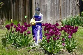 woman with jug on flower bed, Garden Sculpture