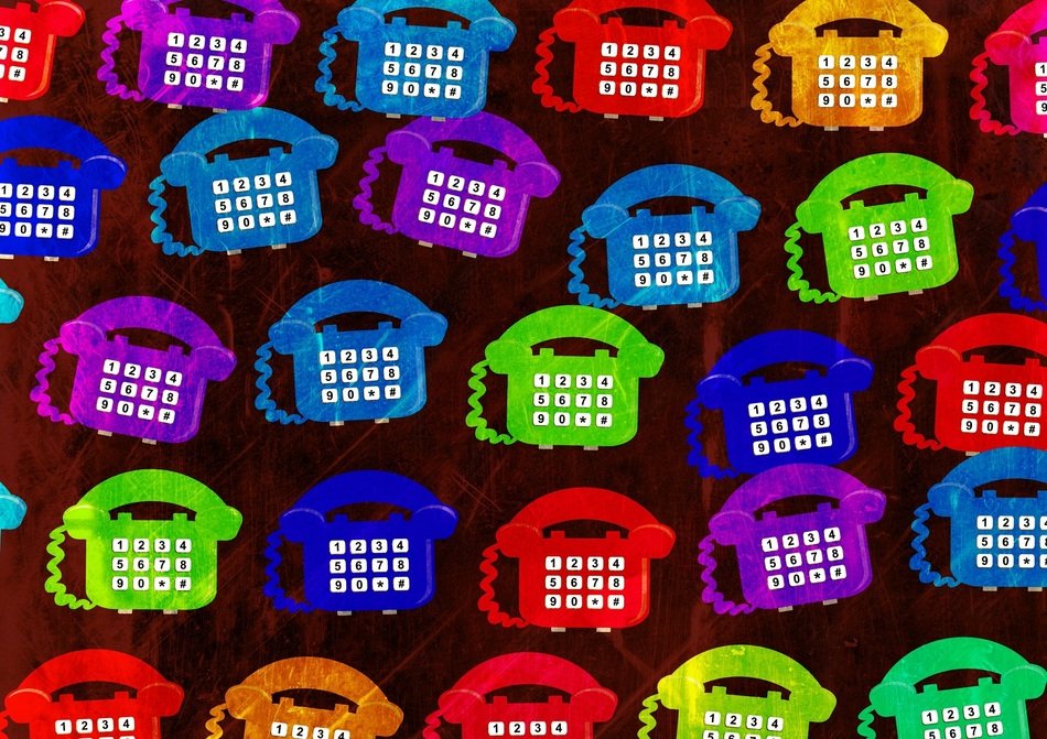 colored phones on a brown background