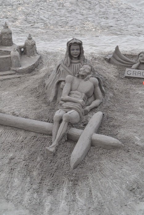 black and white picture of sand statue