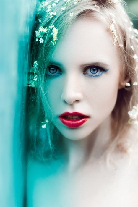 portrait of a beauty model with flowers in hair