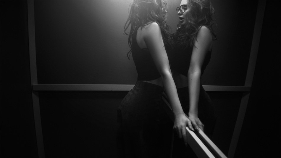 Girl In the Elevator dark photo