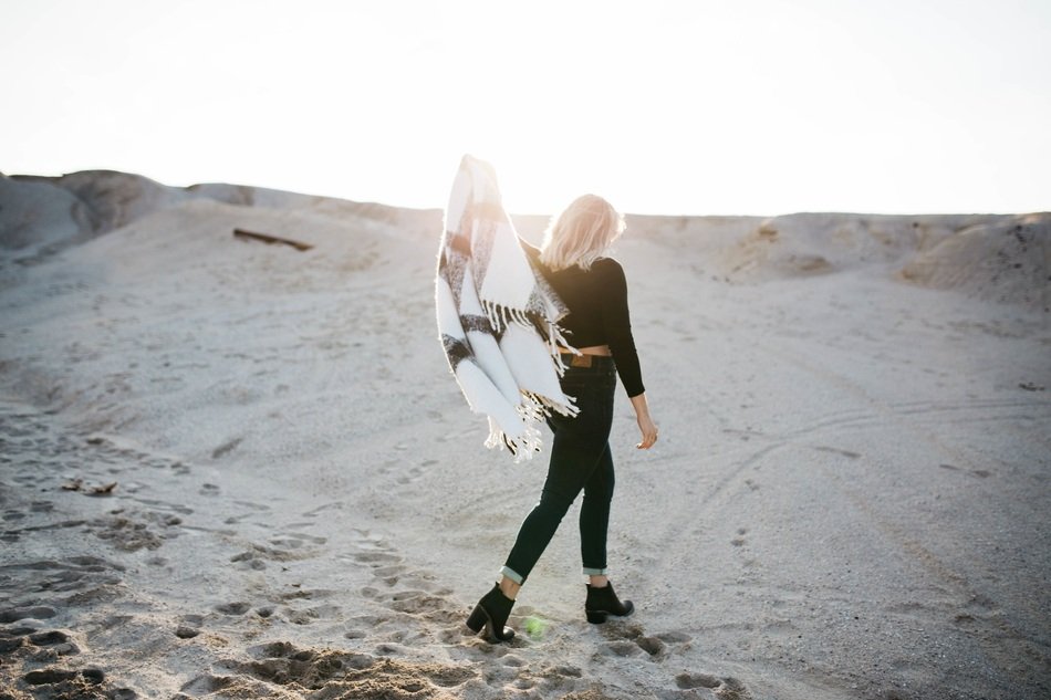 girl on the beach after a picnic