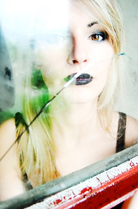 blonde behind glass