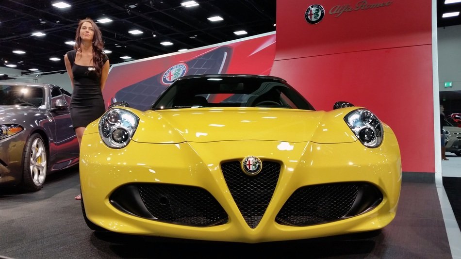 yellow alpha romeo in the cabin