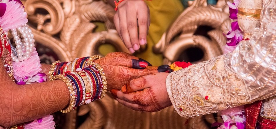 hands in henna for indian wedding