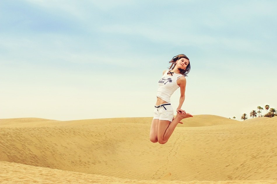 girl jumping in the canary islands